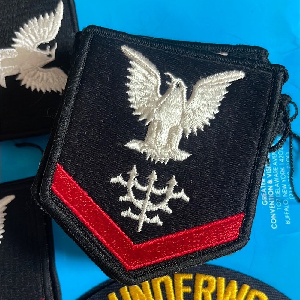 U.S. Navy rating badge for a Construction Mechanic 3rd Class